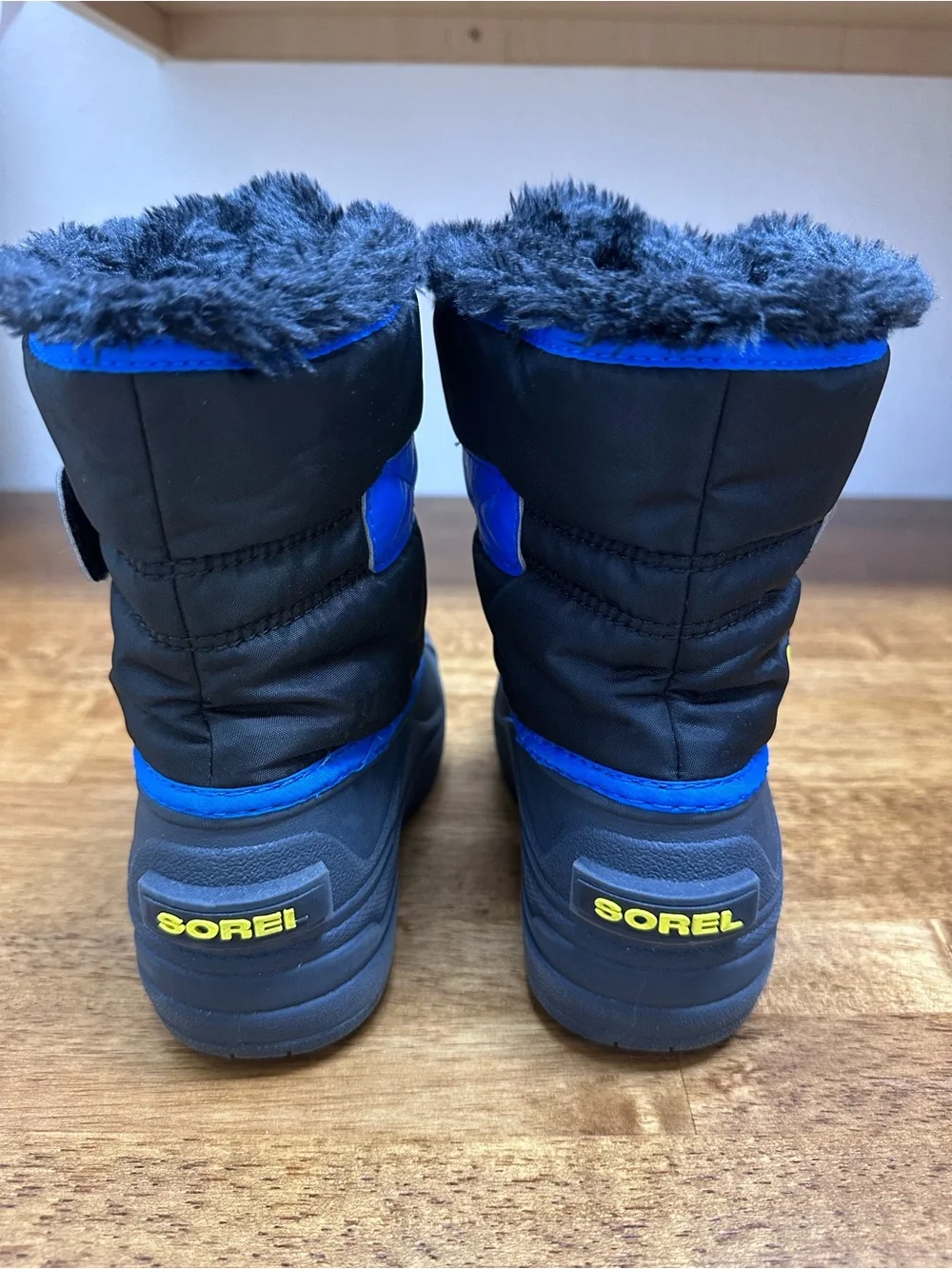 Sorel Kids Black and Blue Winter Boots with Yellow Logo